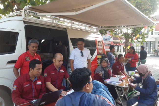 Pelayanan Adminduk Dinas Dukcapil Klaten di acara CarFreeDay bahagiakan masyarakat.