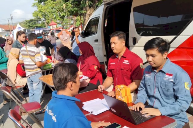 Pelayanan Adminduk Dinas Dukcapil Klaten di acara CarFreeDay bahagiakan masyarakat.