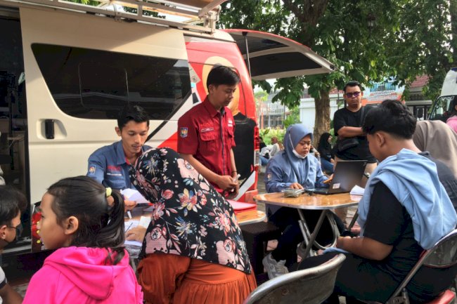 Pelayanan Adminduk Dinas Dukcapil Klaten di acara CarFreeDay bahagiakan masyarakat.