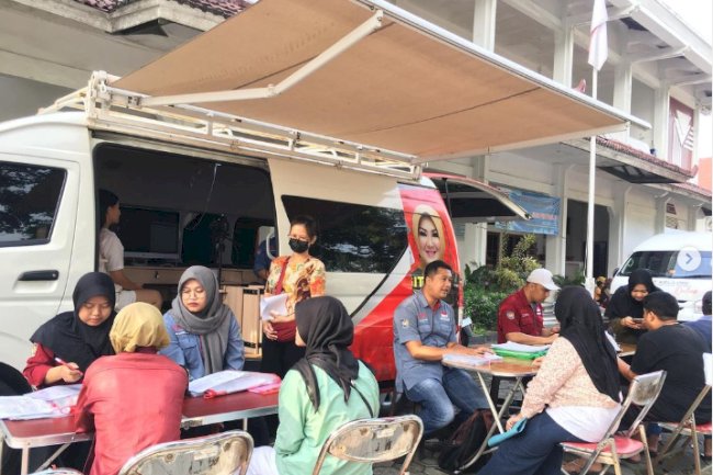 Pelayanan Adminduk Dinas Dukcapil Klaten di acara CarFreeDay bahagiakan masyarakat.
